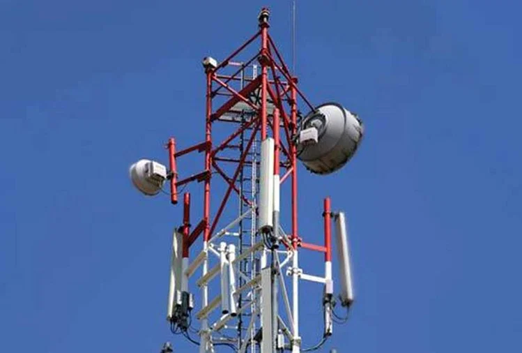 Woman on mobile tower